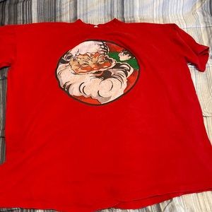 Vintage single stitch Santa Claus T-shirt from the 90s red with big logo
